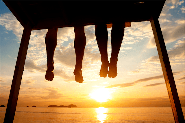 legs pier sunset feet toes silhouette dangling summer orange yellow black locations