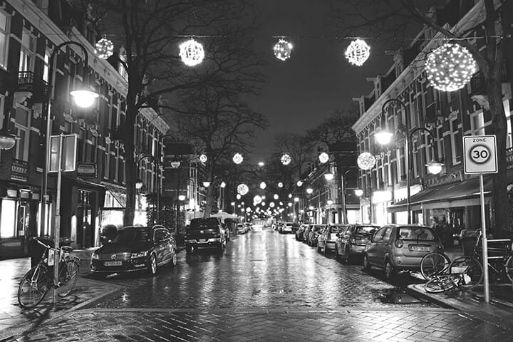 night time street star burst lights cars wet road street photography portrait city people camera subject light how to tutorial guide