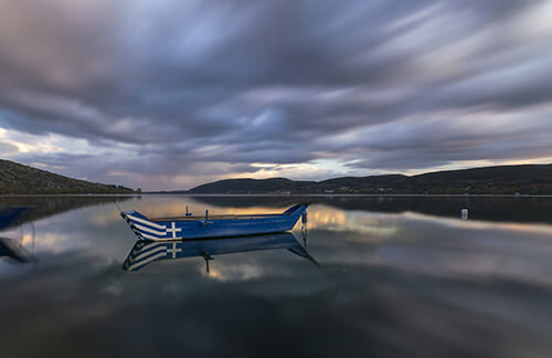 blurry clouds in sky water in boat