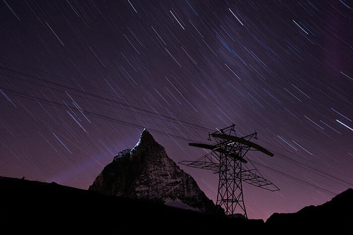 night's sky with streaking stars