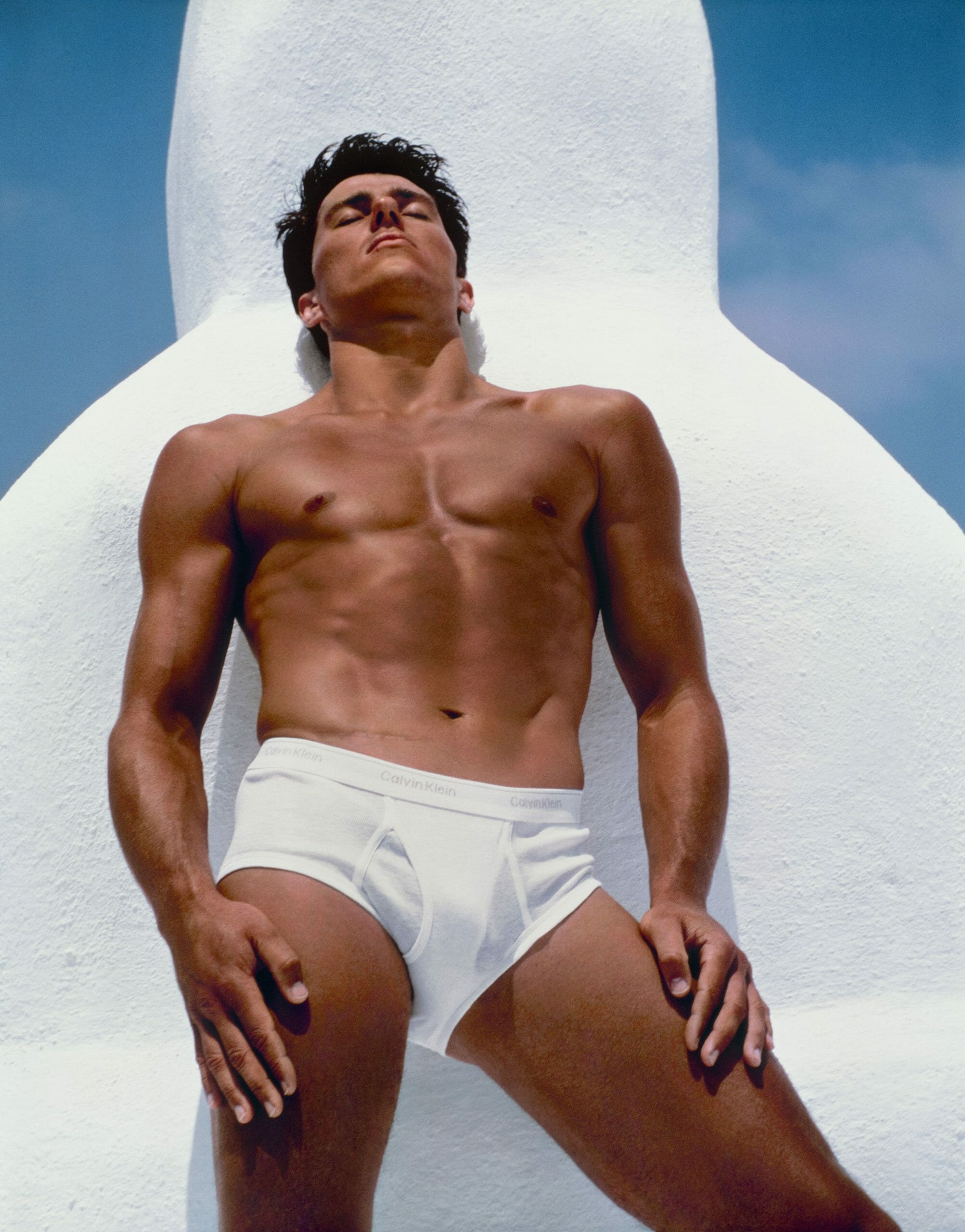bruce weber 1 Bronzed muscular man in underwear sunbathing LGBTQ+ photography