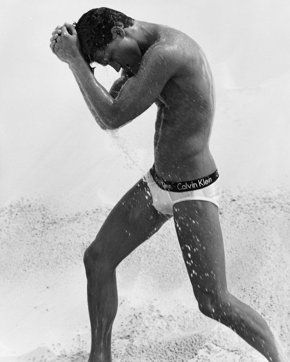bruce weber man in underwear being drenched in water LGBTQ+ photography