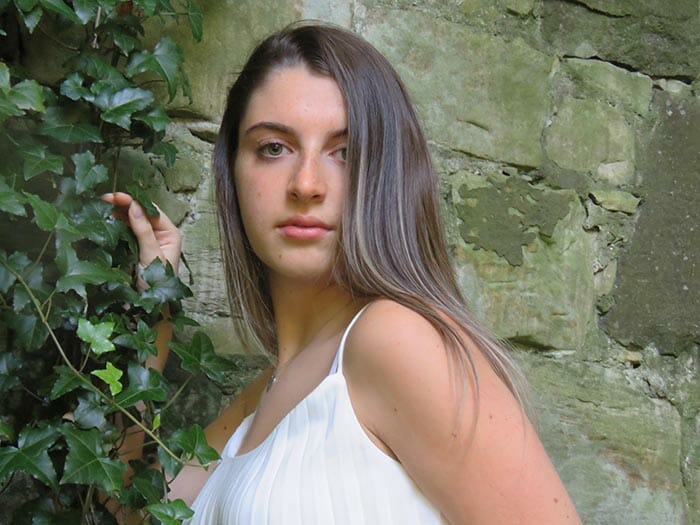 IMG_0318 Andrea standing by leaves by Avril McPherson Copyright 2020