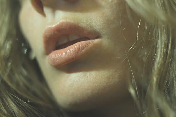 boudoir 11 woman with lips slightly apart