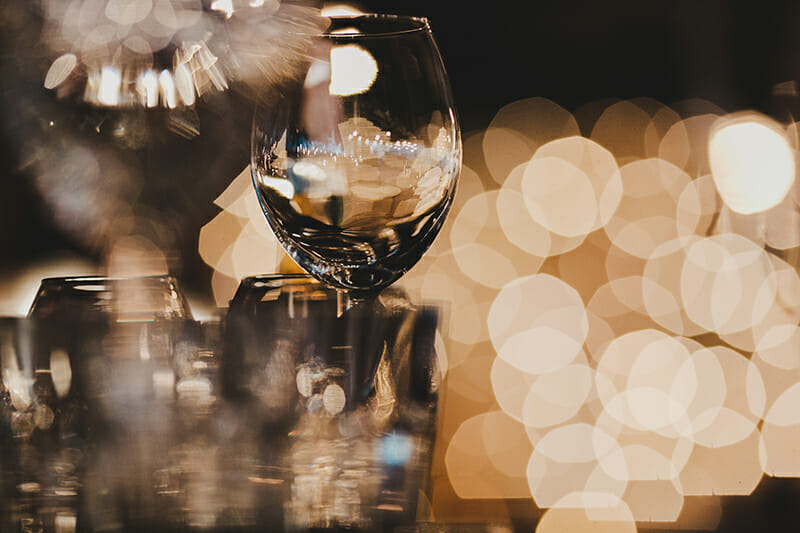 Blurred,Picture,Of,Glassware,Standing,On,The,Table Glassware Photography