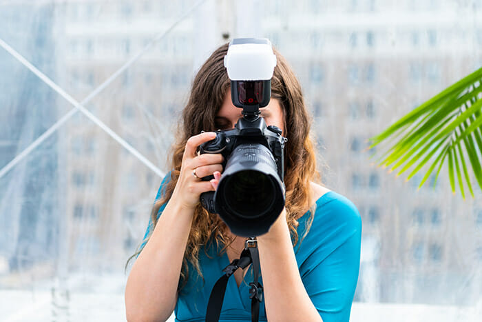 One,Young,Wedding,Photographer,Woman,Girl,Covering,Face,With,Camera architectural photography tutorial image 5