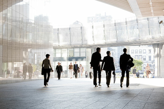 A,Group,Of,People,Is,Against,The,Backdrop,Of,Modern architectural photography tutorial image 11