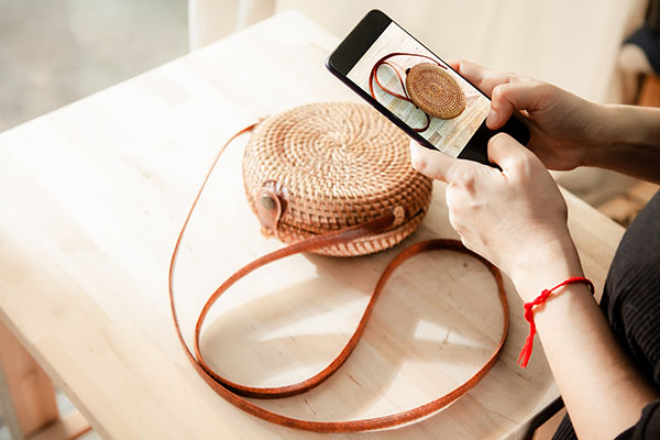 Women,Taking,Photo,To,Bags,And,Products,With,Cell,Telephone Product Photography Tutorial