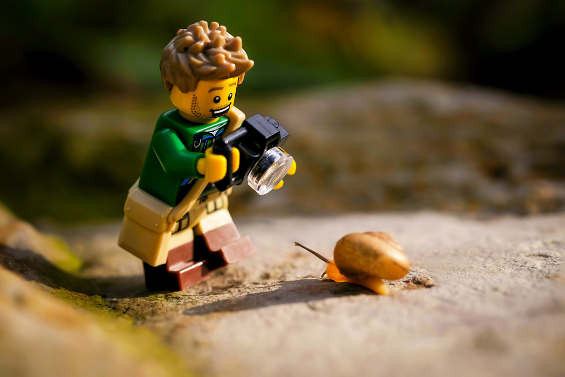 Indonesia,,Feb,9,,,2021.,Lego,Hiker,Taking,Photo,Of Miniature Photography Tutorial