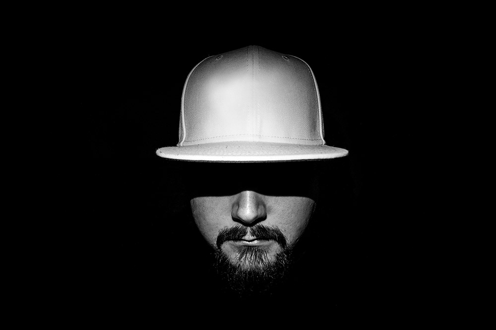 Low,Light,Monochrome,Portrait,Of,A,Man,With,A,White